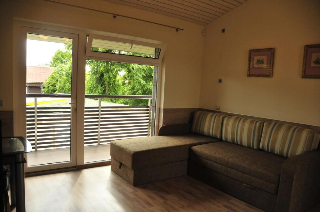 Apartamentai Trys Pusys Швентої Номер фото