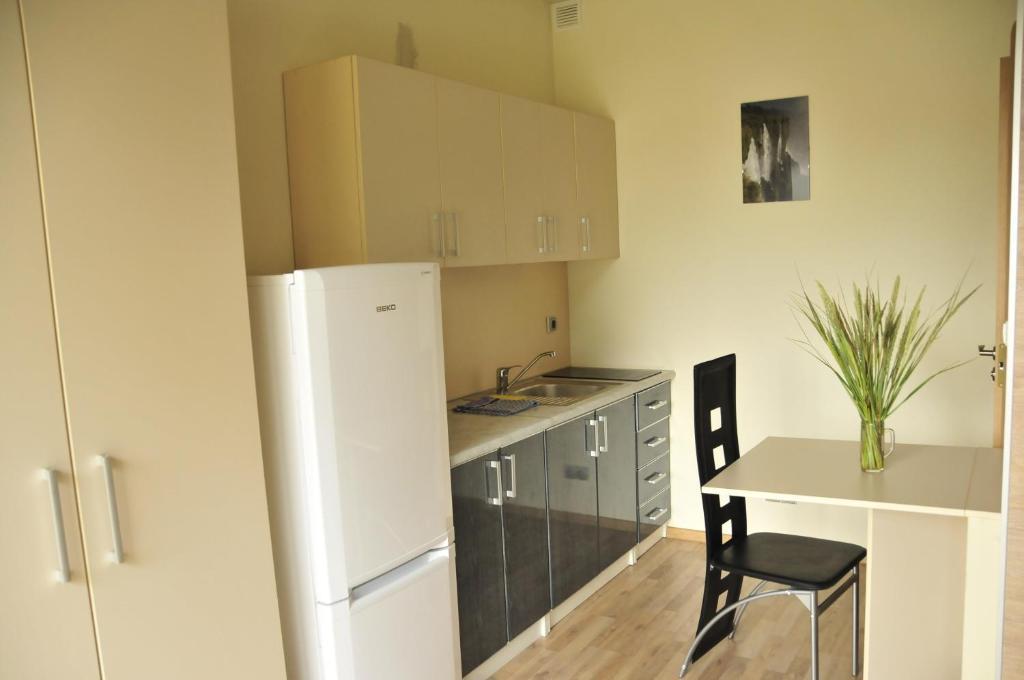 Apartamentai Trys Pusys Швентої Номер фото